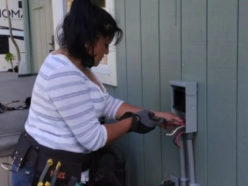 Licensed electrician wiring an exterior subpanel in Union Mill
